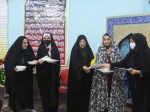مراسم پرچم گردانی حرم مطهر امام رضا(ع) با حضور خادمیاران آستان قدس رضوی د رخوابگاه آموزشکده دختران نجف آباد  2